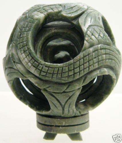 RARE 6 LAYER JADE PUZZLE BALL SPHERE: THIS WONDERFUL PIECE OF WORK IS MADE OF REAL JADE. IN ONE PIECE OF SOLID JADE, WE CARVED IN A FEW LAYERS AND IT IS CARVED FROM INSIDE OUT. THE MOST INTERESTING PART OF THIS ITEM IS THAT ALL THE BALLS