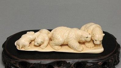 Handcrafted Mammoth Ivory Figurine Cute Polar Bears: 100% Genuine Mammoth ivory handcrafted "Cute Polar Bear" carving, size: 4-3/8" x 2" x 1-1/16" (111mm x 51mm x 27mm). Wood stand size: 6-1/8" x 3" x 1" (156mm x 76mm x 26mm). This carving is carved fro