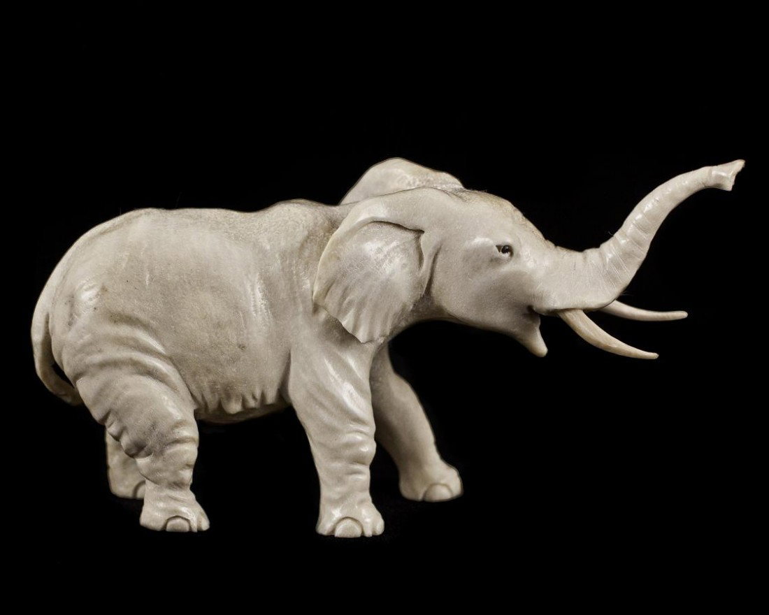Hippo Ivoy tusk "PROUD ELEPHANT" Figurine Carving : 100% Genuine Hippo Tusk Ivory handcrafted "PROUD ELEPHANT", This carving is carved by our artisan. The carving is very detail and wonderful workmanship. Approx Size: 5 x 3 inches.