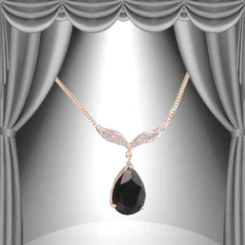 6 CT Smokey Topaz Diamond Necklace: Master jewelers designed your necklace with 1 piece of GENUINE 14X10mm faceted teardrop smokey topaz. 6 pieces of GENUINE single cut diamonds .1 carat tw. 3 grams of sterling silver layered with 18K G