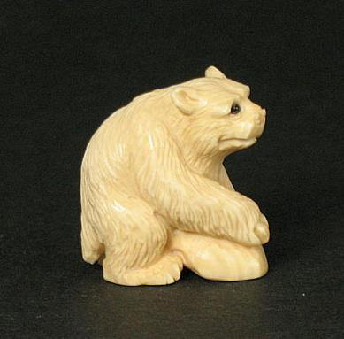 Unique Mammoth Ivory Netsuke Polar Bear Carving: 100% Genuine Mammoth ivory handcrafted "Polar Bear" Ojime Bead, size: 13/16" x 3/4" x 7/16" (21mm x 19mm x 12mm). This ojime bead is carved by our artisan. The carving is very detail and wonderful wor