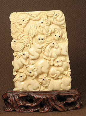Handcrafted Mammoth Ivory Carving 12 Zodiac Animal: 100% Genuine Mammoth ivory handcrafted "12 Zodiac Animal" carving, size: 3-1/4" x 2-1/4" x 1/4" (83mm x 57mm x 7mm). This carving is carved from the mammoth ivory tusk with some age cracks. Our artisa