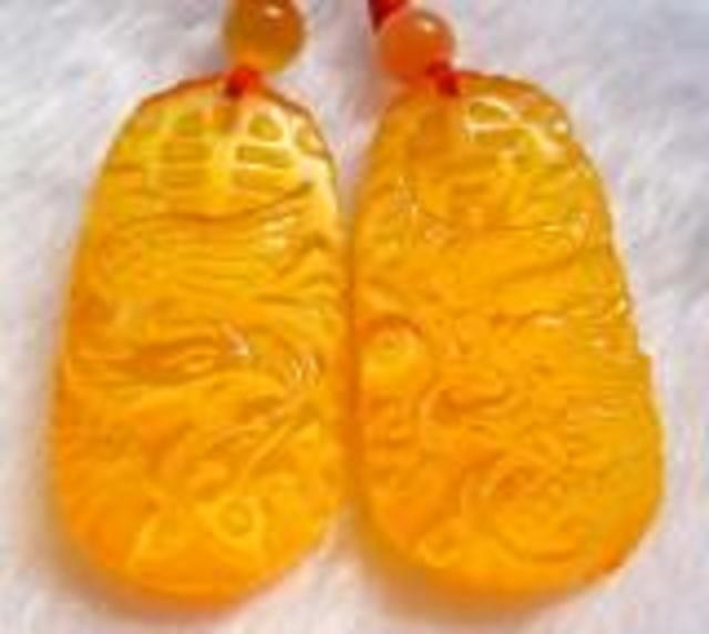 Yellow Cat Eye Dragon Phoenix Love Pair Amulet Pen: The Royal Cameo Carving Jade Charm was carved from a piece of fine grained Jade gemstone more than 200 years ago. The design is unique and very lovely and the carving is delicately performed. Size: 22