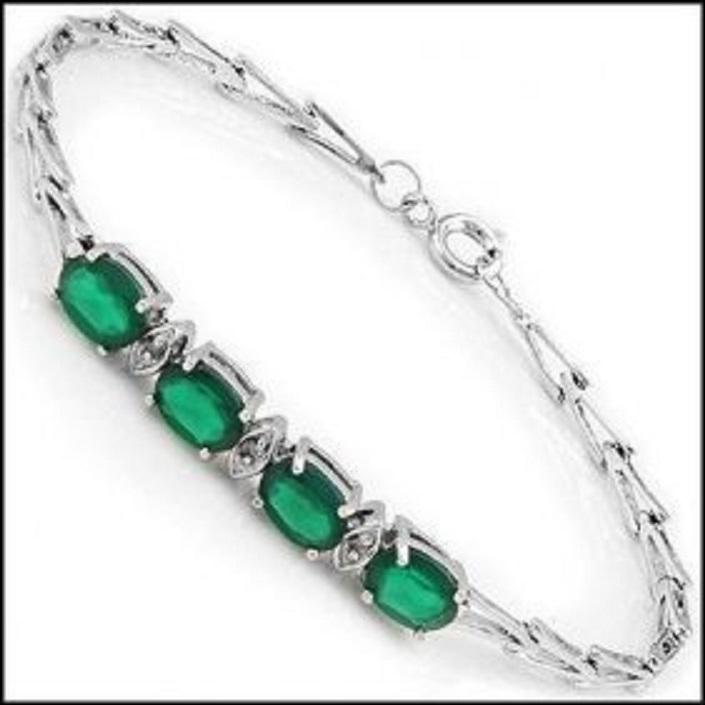 3.66 Cts Green Agate & Diamond Designer Bracelet: 4 pieces of GENUINE 7x5 mm Oval Green Agates.3 pieces of GENUINE single cut diamonds, no treatment.Diamond Color: I-JDiamond Clarity: I2-I3Total Weight: 5.05 grams of base metal layered with platinum 