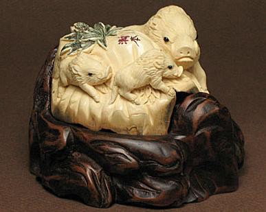 Hand Crafted Mammoth Ivory 3 Wild boar Carving: 100% Genuine Mammoth Ivory 3 Wild Boar - Mother & 2 Babies Carving, size: 2-1/2" x 2-1/2" x 2" (64mm x 64mm x 51mm) (The size is not including the woodstand). Wood stand size: 3-1/4"x 3-1/2" x 2" (83m