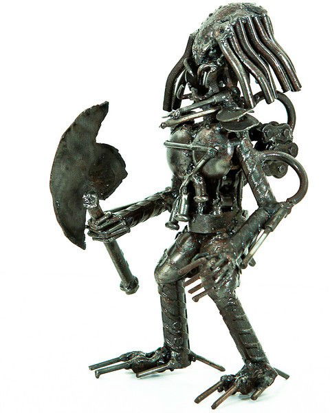 Modern Art Statue from Reclaimed Metal Predator S: These Stautes are made by master craftsmen from scrap metal and other reclaimed metal parts. A typical statue may have spent its previous life as perhaps a car, a boat, a dishwasher and a television a