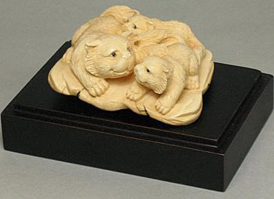Hand Crafted Mammoth Ivory "Cat Family" Carving: 100% Genuine Mammoth ivory handcrafted "Cat family - Mother with 2 babies" carving, size: 2-3/8" x 2" x 1-1/16" (61mm x 51mm x 27mm).. This carving is carved from the mammoth ivory tusk with with some
