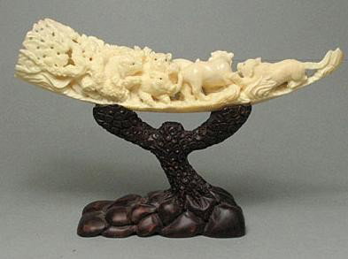Hippo Ivoy tusk 5 Animal Forest Carving w/ Wood Sta: 100% Genuine Hippo Tusk Ivory handcrafted "Hippo Ivory Tusk 5 Animal in Forest Carving With Wood Stand", size: 6"x 1-3/8" x 1" (153mm x 35mm x 25mm).This carving is carved by our artisan. The carving 