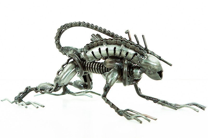 Modern Art Predator Statue: These Stautes are made by master craftsmen from scrap metal and other reclaimed metal parts. A typical statue may have spent its previous life as perhaps a car, a boat, a dishwasher and a television a