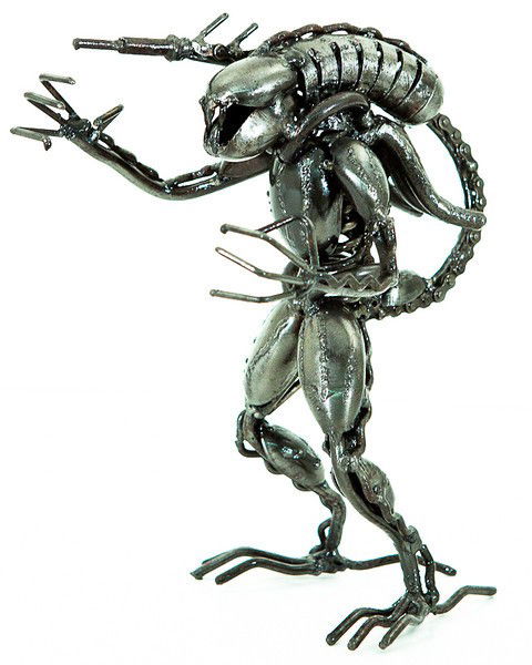 Scrap Metal Art, Predator Hunter Statue: These Stautes are made by master craftsmen from scrap metal and other reclaimed metal parts. A typical statue may have spent its previous life as perhaps a car, a boat, a dishwasher and a television a