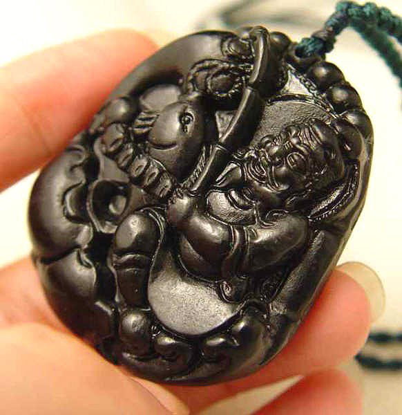 Zhou Dynasty Master Jiang Fishing Pendant: The Royal Cameo Carving Jade Charm was carved from a piece of fine grained Jade gemstone more than 200 years ago. The design is unique and very lovely and the carving is delicately performed. Size: 35