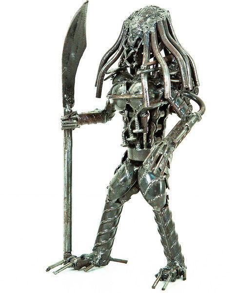 Modern Art Predator Statue: These Stautes are made by master craftsmen from scrap metal and other reclaimed metal parts. A typical statue may have spent its previous life as perhaps a car, a boat, a dishwasher and a television a