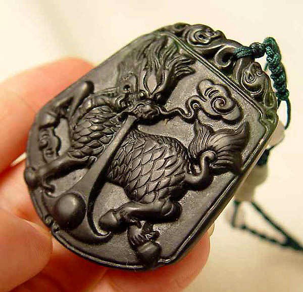 Royal Jade Mythical Powerful Dragon Amulet Pendant: The Royal Cameo Carving Jade Charm was carved from a piece of fine grained Jade gemstone more than 200 years ago. The design is unique and very lovely and the carving is delicately performed. Size: 30