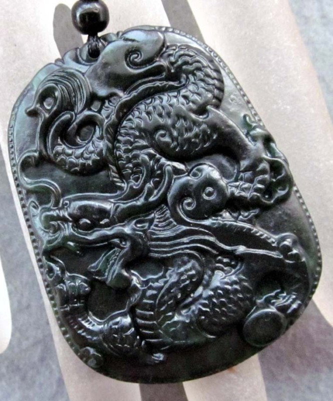 Black Green Jade Super Power Dragon Amulet Pendant: The Royal Cameo Carving Jade Charm was carved from a piece of fine grained Jade gemstone more than 200 years ago. The design is unique and very lovely and the carving is delicately performed. Size: 25