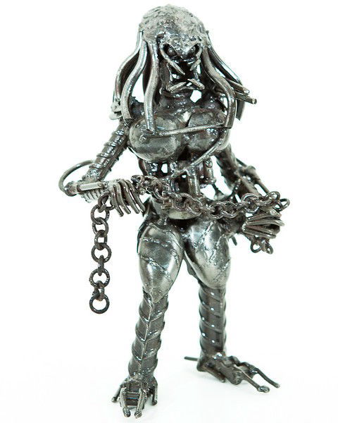 Predator Series - Scrap Metal Art: These Stautes are made by master craftsmen from scrap metal and other reclaimed metal parts. A typical statue may have spent its previous life as perhaps a car, a boat, a dishwasher and a television a