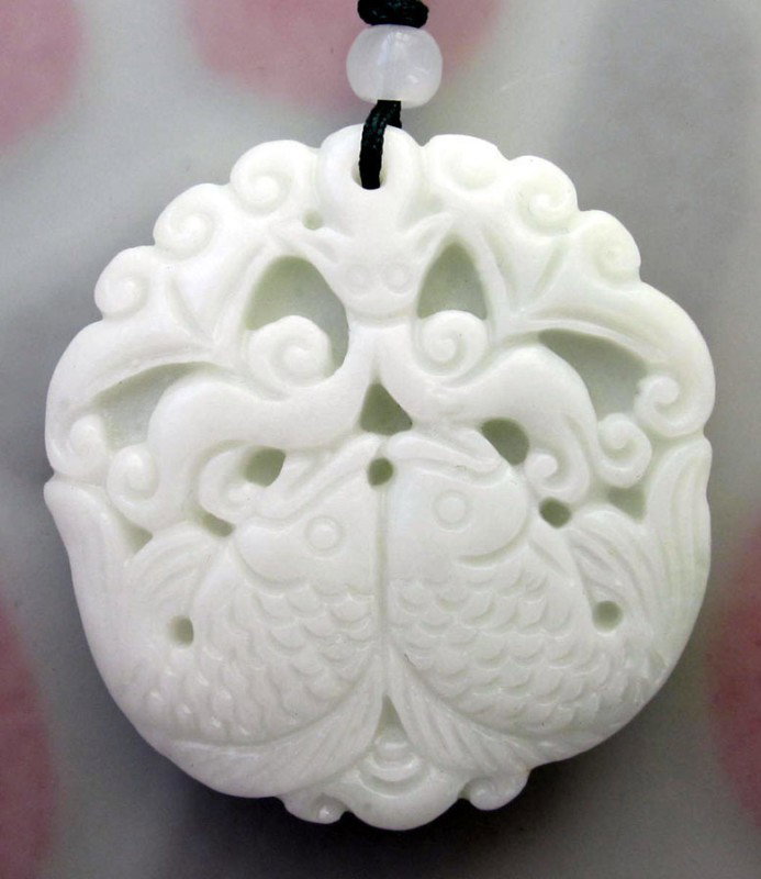 White Green Jade Auspicious Two Fishes Bat Pendant: The Royal Cameo Carving Jade Charm was carved from a piece of fine grained Jade gemstone more than 200 years ago. The design is unique and very lovely and the carving is delicately performed. Size: 37