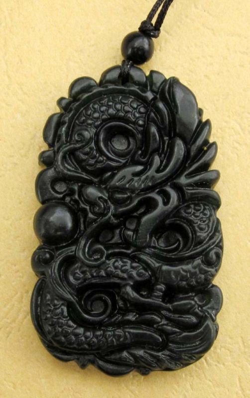 Black Green Jade Dragon Spit Pearl Amulet Pendant: The Royal Cameo Carving Jade Charm was carved from a piece of fine grained Jade gemstone more than 200 years ago. The design is unique and very lovely and the carving is delicately performed. Size: 25