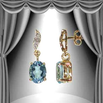 1.6 CT Blue Topaz Diamond Dangle Earrings: Master jewelers designed your earrings with 1 piece of GENUINE 8X6mm oval blue topaz. 1 piece of GENUINE single cut diamond .01 carat tw. 0.7 gram of brass layered with 18K Gold.