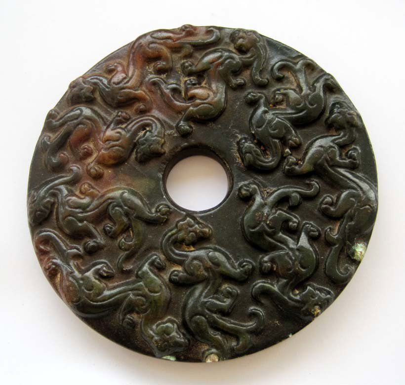 HUGE ANTIQUE 700 CT CHINESE JADE CARVING DISC: The Royal Cameo Carving Jade Charm was carved from a piece of fine grained Jade gemstone more than 200 years ago. The design is unique and very lovely and the carving is delicately performed. Size: 70