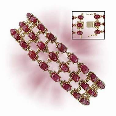 Genuine 40 CT Cabochon Ruby 3 Row Bracelet: Master jewelers designed your bracelet with 66 pieces of GENUINE 6X4mm faceted oval cabochon Ruby. 29.6 grams of sterling silver layered with 18K Gold. The length is 7 1/2 inches The width is 3/4 inch