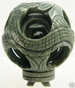 REAL JADE 6 LAYER PUZZLE BALL: THIS WONDERFUL PIECE OF WORK IS MADE OF REAL JADE. IN ONE PIECE OF SOLID JADE, WE CARVED IN A FEW LAYERS AND IT IS CARVED FROM INSIDE OUT. THE MOST INTERESTING PART OF THIS ITEM IS THAT ALL THE BALLS 