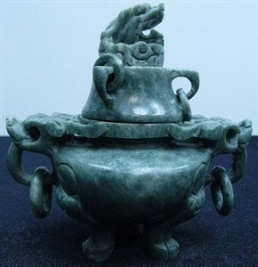 REAL JADE DRAGON INCENSE BURNER: This Incense Burner is made from Southern Jade. Dark green with some spots light green. The bottom and the cover are seperate. Dragon heards are carved on the lid and the body. Very detailed carving. 