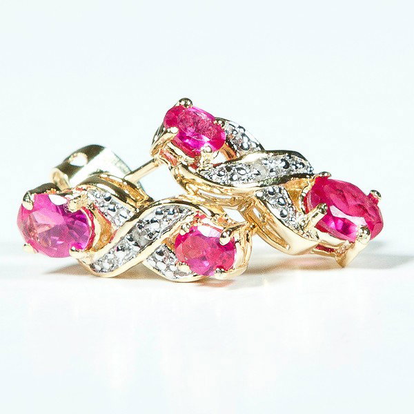 2.2 CT Ruby Diamond Earrings: Master Jewelers designed your earrings with 2 5x3mm rubies, 2 3x1.5mm rubies. set in fine 925 sterling silver and layered with 18K Gold. The height is 3/4inches or 19mm and the width is1/4inches or 1/