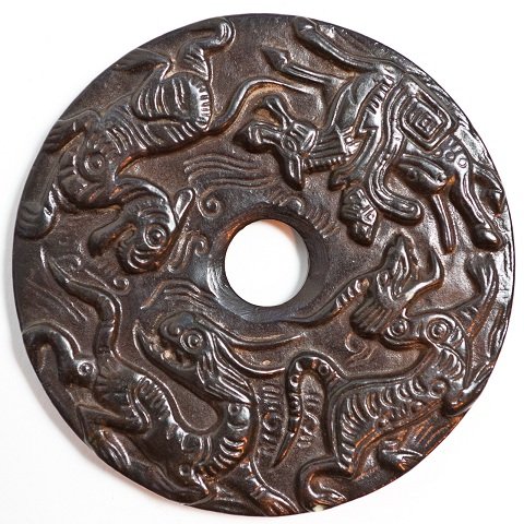 3 3/4" JADE 4 DRAGONS OF THE WIND CARVING DISC: The Royal Cameo Carving Jade disc was carved from a piece of fine grained Jade gemstone. The design is unique and very lovely and the carving is delicately performed. Size: 800+ Carat, 4 3/4" Transluc