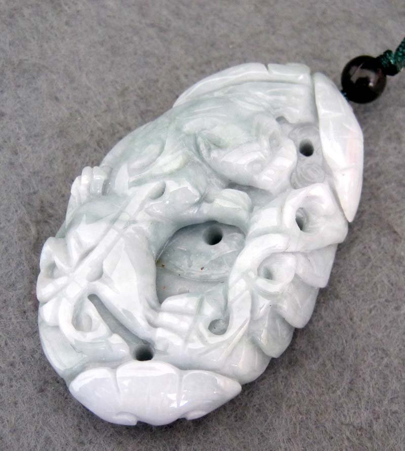 Very Rare 400 CT Marbled Jade Bamboo Jaguar Carvin: The Royal Cameo Carving Jade Charm is hand carved from a piece of fine grained Jade gemstone. The design is unique,lovely and the carving is delicately performed. Size: 400 Carat Approx Size: 2 1/2" x