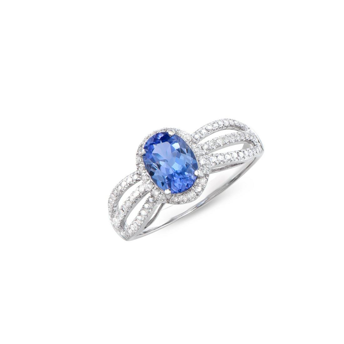 14KT White Gold 1.15ct Tanzanite and Diamond Ring: (1) Tanzanite with a total weight of 1.15cts. (42) round Diamonds with a total weight of 0.18cts with a color of H-I and clarity of I1-I2. Total weight of the ring is 2.50 grams. Ring size 7.5.