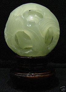 REAL JADE 5 LAYER PUZZLE BALL: THIS WONDERFUL PIECE OF WORK IS MADE OF REAL JADE. IN ONE PIECE OF SOLID JADE, WE CARVED IN A FEW LAYERS AND IT IS CARVED FROM INSIDE OUT. THE MOST INTERESTING PART OF THIS ITEM IS THAT ALL THE BALLS 