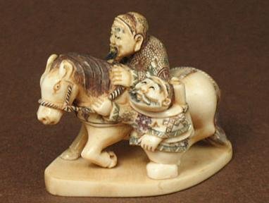 Mammoth Ivory "2 MEN & HORSE" Netsuke: 100% Genuine Mammoth ivory handcrafted "2 Men & Horse" netsuke, size: 1-15/16" x 1-7/16" x 1-1/16" (49mm x 36mm x 27mm). This netsuke is carved by our artisan. The carving is very detail and wonderful