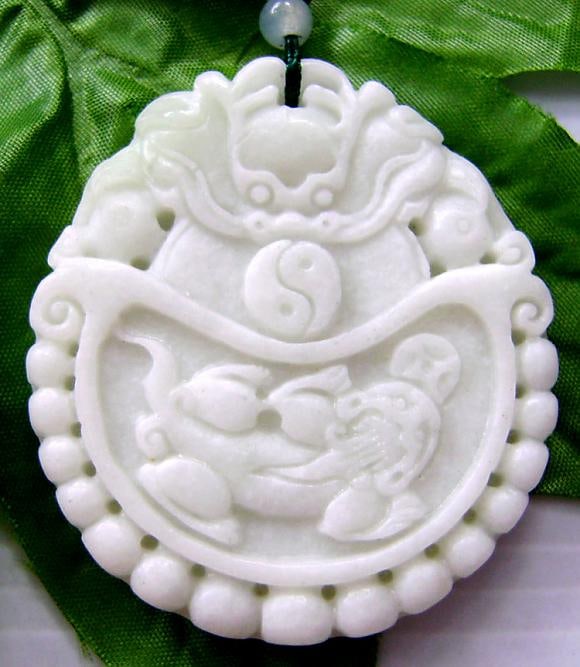 Chinese Jade Dragon Tai-Ji And Pi-Xiu Dragon Coin Amulet: Size: 50mm x 45mm Auspicious Chinese jade carved "Dragon Tai-Ji Pixiu Dragon". This is an auspicious pattern pendant for you to wear. It is believed to bring you good luck and wealth. Free silk cord f