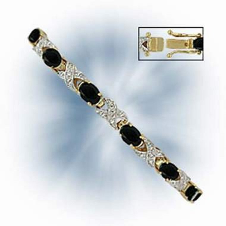 Genuine 12 CT Sapphire Diamond Bracelet: Master jewelers designed your bracelet with 12 pieces of Sapphire, 12 pieces of GENUINE single cut diamonds .1 carat tw. 13.8 grams of sterling silver layered with 18K Gold. The length is 7 1/2 inches