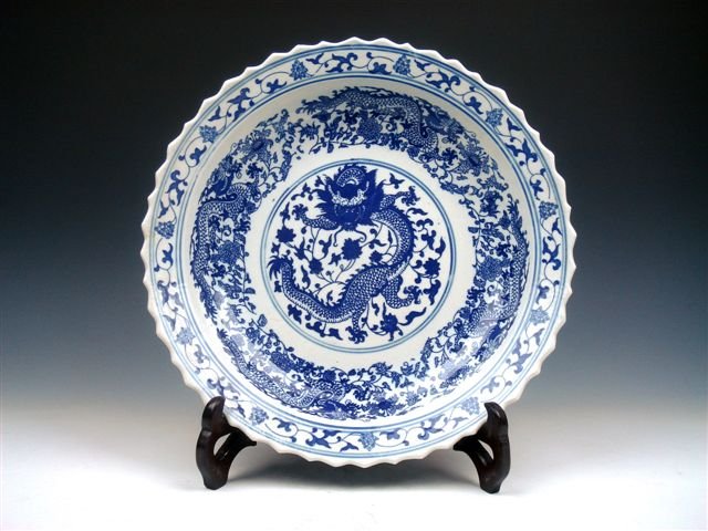 Chinese Dragons Flowers Painted Large Charger Plat: Item Description: This is a very nice Chinese blue&white (Qinghua) dragons and flowers painted porcelain large charger/plate *display stand sold separately*. Excellent workmanship and the piece looks 