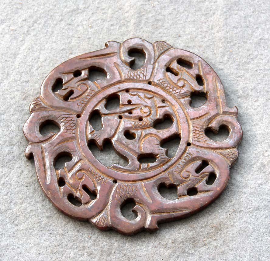 4 1/2" 800+ CT Jade Dragon Shield Carving Disc: The Royal Cameo Carving Jade disc was carved from a piece of fine grained Jade gemstone. The design is unique and very lovely and the carving is delicately performed. Size: 800+ Carat, 4 1/2" Transluc