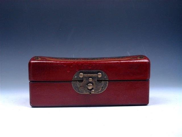 Red Finish Leather Dragon Wooden Jewelry Box: Item Description: This is a very nice red finish leather armored dragon & phoenix hand painted wooden jewelry box with brass lock, excellent workmanship and the piece looks even more attractive in per