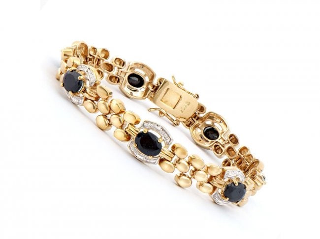 11.05 Cts Sapphire & Diamond Designer Bracelet $1,775!: One Plated 18KT Yellow Gold 11.00ctw Black Sapphire and Diamond Bracelet. (7) Black Sapphire stones with a total weight of 11.00cts. (14) Diamonds with a total weight of 0.10cts with a color of I-J an