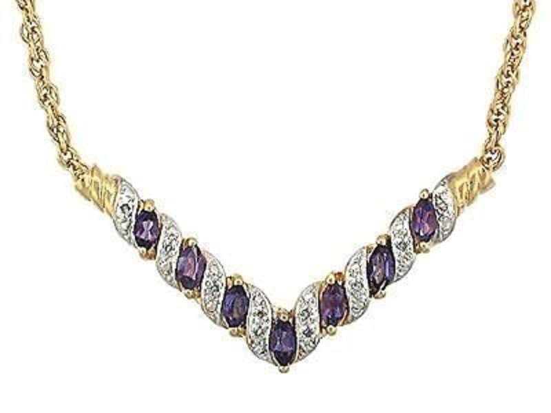 2.72 Cts Amethyst & Diamond Designer Necklace: 1 piece of GENUINE 8X4mm Marquis Shape Amethyst quality AAA no treatment.6 pieces of GENUINE 6x3mm Marquis Shape Amethysts quality AAA no treatment.8 pieces of GENUINE single cut 1.1mm rounds diamonds