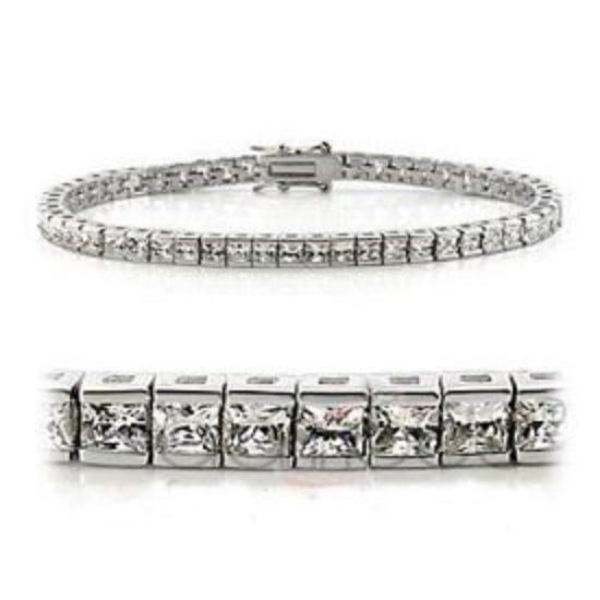 0.32 CT Diamond Designer Bracelet: 41 Single cut round diamonds Color: I-J & Clarity:I2-I3 No treatment.10.55 grams of brass layered with platinum rhodium. Length is 7 1/2 inches.The width is 1/4 inches.