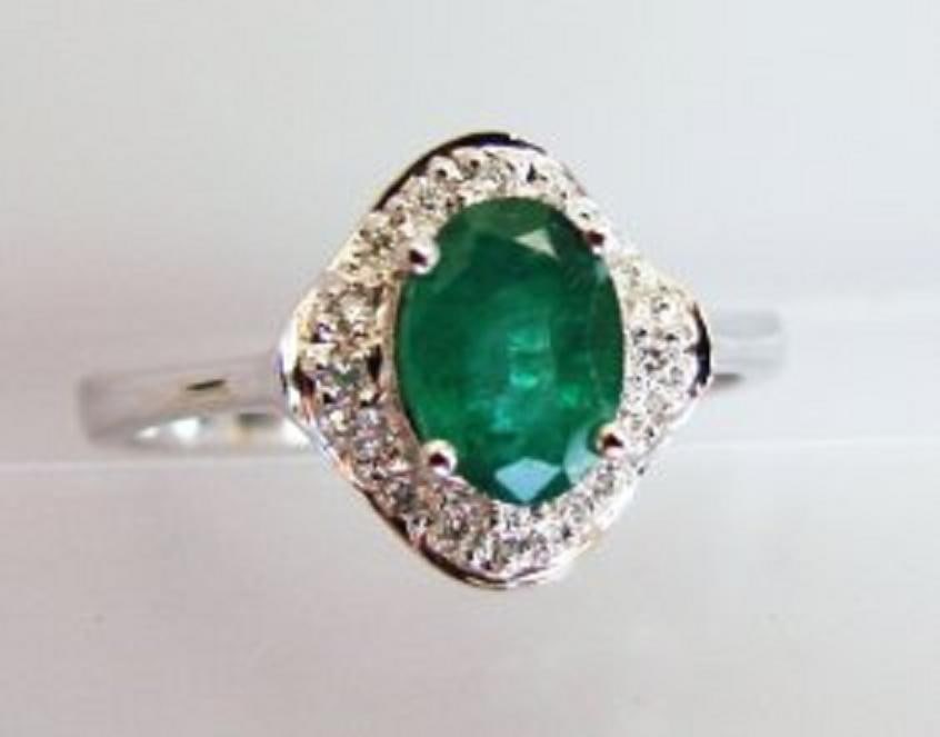 Columbia Emerald & Diamond Ring Appraised $7,700: Gem: Natural Columbia & Diamond Quantity: 1 Diamond Weigh: .30 carat 12 pieces round brilliant ( Clarity: S1, Color: H-I) Columbia Emerald weight: 1.10 carat 1 piece oval shape (Clarity: Transparent,