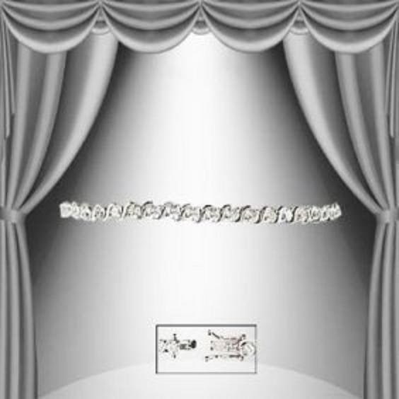 0.27 CT Diamond Designer Bracelet $1,750!: 35 Single cut round diamonds Color: I-J & Clarity:I2-I3 No treatment. 9.75 grams of brass layered with platinum rhodium. Length is 7 1/2 inches.The width is 1/4 inches.