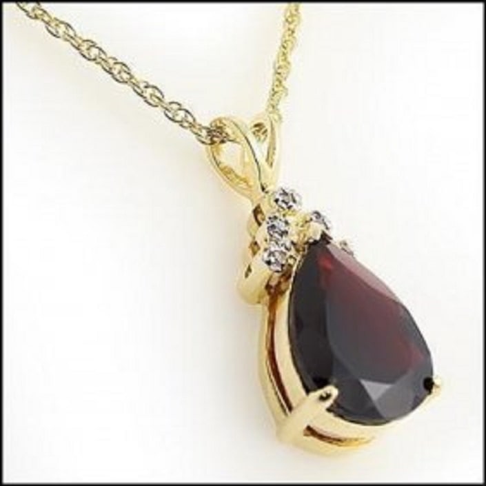5.38 CT Garnet & Diamond Designer Necklace: Master jewelers designed your Necklace with: 1 piece of GENUINE 8X10mm faceted oval Garnet quality AAA no treatment. 5 pieces of GENUINE single cut diamonds 0.12 carat tw.I color & SI Clarity no treat