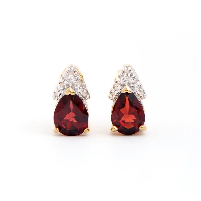 2.12 ct Natural Garnet Diamonds18KGP Sterling Silver Designer Earrings $1,495!: Gemstone: Garnet Color: Brown Shape: Pears Size: 8x6Quantity: 2CTW: 2.04 Diamond Description Shape: Rounds Size: 1.1mm Quantity: 10CTW: 0.08Grade: I3Color: H-I Material Information:Plating Material: Y
