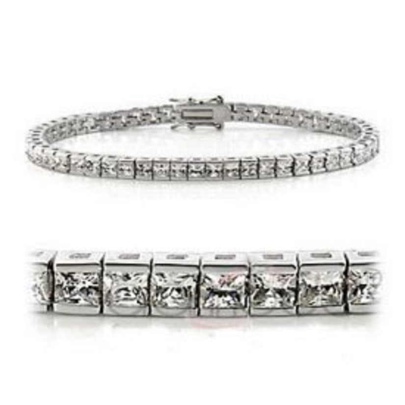 0.32 CT Diamond Designer Bracelet $1,390!: 41 Single cut round diamonds Color: I-J & Clarity:I2-I3 No treatment.10.55 grams of brass layered with platinum rhodium. Length is 7 1/2 inches.The width is 1/4 inches.