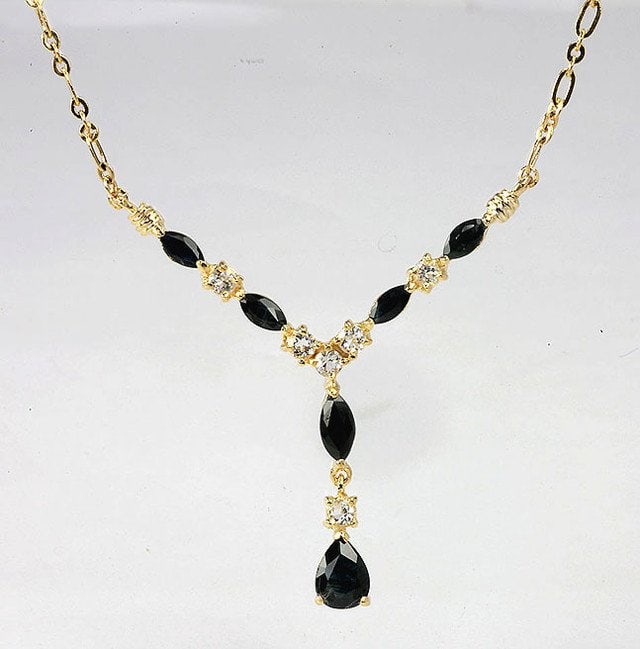 4.10 Cts Sapphire & White Topaz 18KGP Necklace: 1 piece of GENUINE 8X6mm faceted Pear Shape Sapphire quality AAA no treatment.4 pieces of GENUINE 6X3mm faceted marquise Sapphires quality AAA no treatment.1 piece of GENUINE 8X4mm faceted marquise Sa