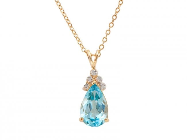 5.05 Cts Blue Topaz & Diamond Designer Necklace $925: One Plated 18KT Yellow Gold 5.05ctw Blue Topaz and Diamond Pendant with Chain. 1 piece of Oval Blue Topaz measuring 14x10mm. 5 pieces of 1.1mm round diamonds. Total weight of this pendant with chain i
