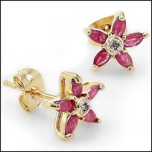 1.07 CT Ruby & Diamond Designer Earrings $900: 10 pieces of GENUINE 4x2 mm Red Rubies quality AAA no treatment.2 pieces of GENUINE single cut round diamonds 0.02 carat Tw.1.55 grams of brass layered with 18K yellow gold.The motif width is 5/8 inch