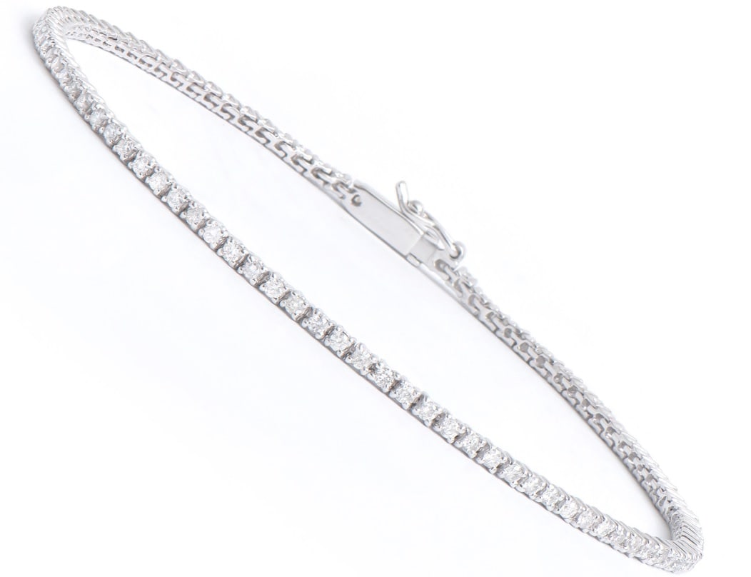 1.18 Ct Certified Diamond 14K Designer Gold Tennis Bracelet $15,850!!!: Main : 1.18Ct of Round shape Diamonds 1.4mm, Color: H-I, Quality: I1-I2.5.85 grams 14K solid white gold.Size 7.5.Comes with signed certificate for $15,850.00!