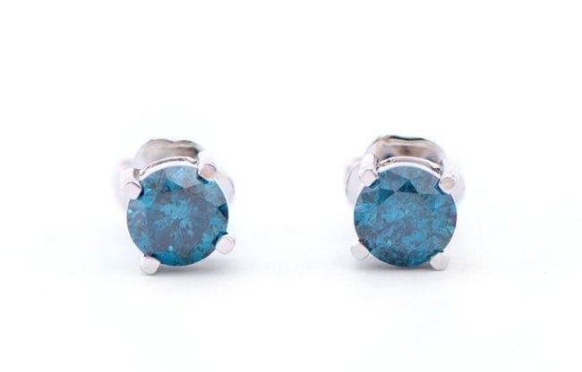 0.85 Cts Certified Natural London Blue Diamonds 14K Designer Earrings MSRP $7,795!: Shape: RoundsSize: 4.5 mm Quantity: 2CTW: 0.85Grade: I1-I2Color: Dark Blue Material Information:Primary Material: 14k Solid GoldColor: White Gold Jewelry Information:Mount Type: EarringGender: WomenOv